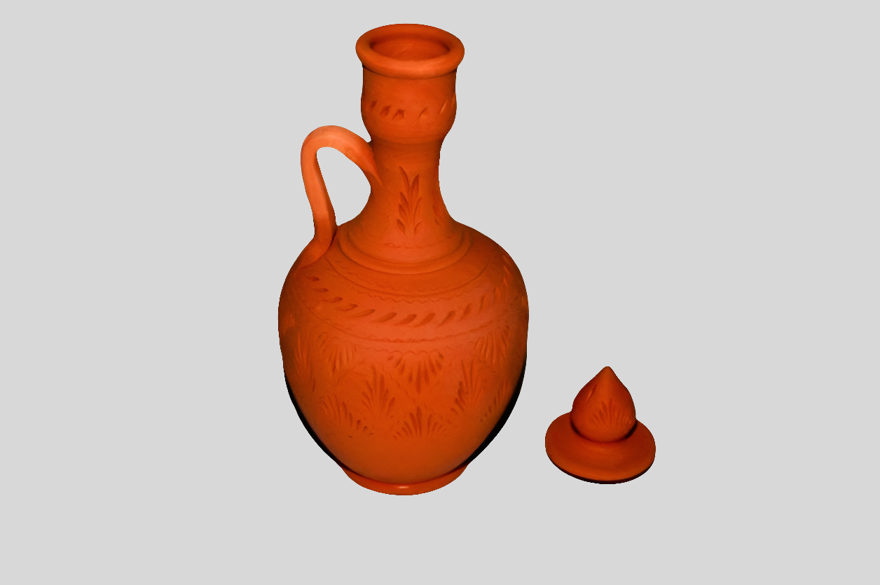 CARAFE SCULPTÉE À MANCHE EN TERRE CUITE
